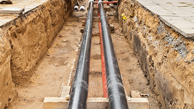 verweist auf: Zulassung von Wärme- und Kältenetzen Fernwärmerohre in einer Baugrube (verweist auf: Zulassung von Wärme- und Kältenetzen)